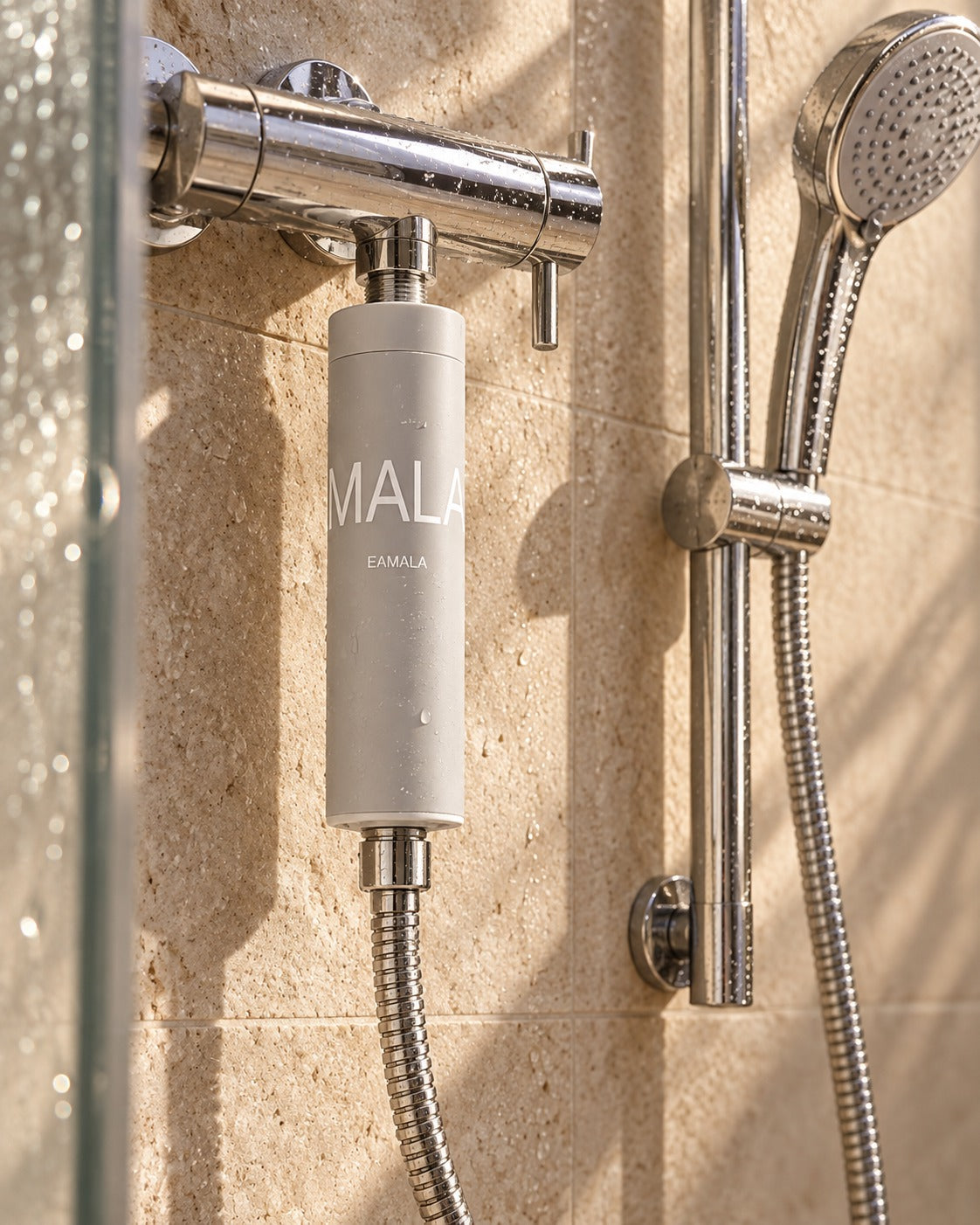 Concept showing EAMALA between a shower outlet and hose; check your own fitting layout